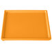 An orange rectangular cast aluminum cooling platter.