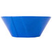 A blue bowl with a blue surface with white specks.