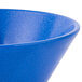 A close up of a blue Tablecraft cast aluminum serving bowl with speckles.