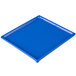 A blue rectangular cast aluminum cooling platter with speckles.