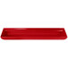 A red Tablecraft cast aluminum rectangular platter with flared ends.