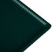 A hunter green rectangular cast aluminum cooling platter with white speckles on the surface.