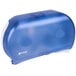 A blue plastic San Jamar Twin Classic toilet tissue dispenser with white text holding two rolls of toilet paper.