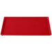 A red Tablecraft rectangular cast aluminum cooling platter.