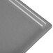 A gray granite rectangular metal Tablecraft cooling platter.