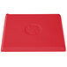 A red cast aluminum rectangular cooling platter with a logo on it.
