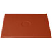 A red rectangular copper cooling platter with a logo on it.