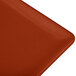 A close up of a copper rectangular platter with a blank background.