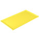 A yellow rectangular cast aluminum Tablecraft cooling platter.