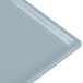 A gray rectangular cast aluminum platter with a textured surface.