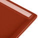 A copper cast aluminum rectangular cooling platter with a red metal surface.
