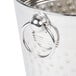An American Metalcraft stainless steel wine bucket with a hammered design and a handle.