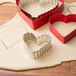 A Wilton 4-piece metal heart shaped cookie cutter set.