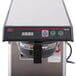 A Bunn SmartWAVE airpot coffee brewer on a counter with buttons and a digital display.