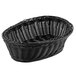 A black Tablecraft oval rattan basket with a handle.