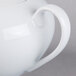 A white Schonwald Continental teapot with a lid and a handle.