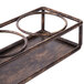 A Clipper Mill rectangular iron condiment stand with 3 rings on it.