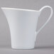 A Schonwald continental white porcelain creamer with a handle.