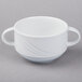 A white Schonwald soup cup with two handles.