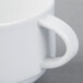 A close-up of a Schonwald Donna white two-handled soup cup.