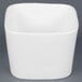 A white square CAC China sauce cup.