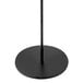 A black metal stand with a black pole.