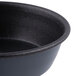 A Matfer Bourgeat black steel round mini cake pan with a black rim.