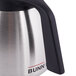 A close up of a Bunn stainless steel coffee carafe.