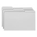 A stack of Smead legal size file folders with reinforced assorted tabs on a white background.