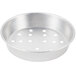 A silver round pan with holes.