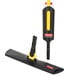 A black and yellow Rubbermaid spray mop.