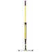 A Rubbermaid yellow and black mop kit with a long handle.