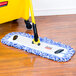 A Rubbermaid blue microfiber wet mop pad with a yellow hook.