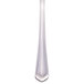 A close-up of a Libbey stainless steel dinner fork with a white handle.