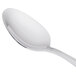 A Libbey Cortland stainless steel teaspoon with a silver handle.