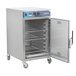 An open Alto-Shaam half height stackable cook and hold oven with a rack inside.