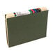 A green Smead box of 25 letter size hanging file folders with colorful tabs.