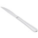 A Libbey Cortland stainless steel steak knife with a fluted silver handle.