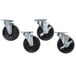 A group of Avantco casters with metal and black rubber wheels.