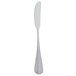 A Libbey stainless steel butter knife with a white handle.