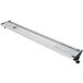 A long, rectangular white granite display light with a curved metal bar and cool lighting.
