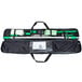 A white bag with black and green Unger window cleaning tools inside.