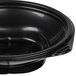 A black plastic Fabri-Kal SideKicks bowl with a plastic lid.