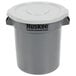A grey plastic Continental Huskee trash can with a grey lid.