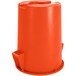 An orange plastic Carlisle Bronco 44 gallon trash can with a lid.