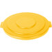 A yellow plastic lid for a Carlisle Bronco trash can.
