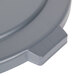 A close-up of a Carlisle grey plastic lid with a handle.