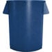 A blue Carlisle plastic round trash can with a lid.