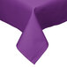 A close-up of a purple Intedge square tablecloth with a folded edge.