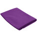 A purple folded Intedge cloth table cover.